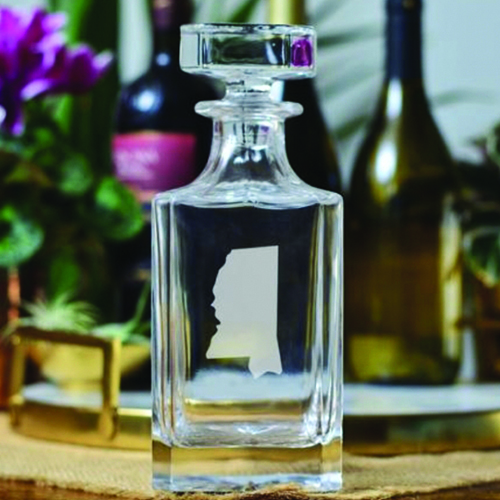 a close up of a glass vase on a table